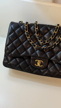 Chanel Bag, 2010 Black Lambskin Quilted Jumbo Single Flap Bag
