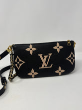 Louis Vuitton Bag, Bicolor Monogram Empreinte Leather
Multi Pochette Accessoires