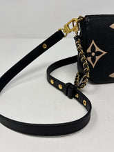Louis Vuitton Bag, Bicolor Monogram Empreinte Leather
Multi Pochette Accessoires