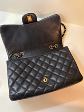 Chanel Bag, 2010 Black Lambskin Quilted Jumbo Single Flap Bag