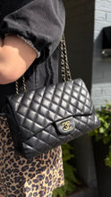 Chanel Bag, 2010 Black Lambskin Quilted Jumbo Single Flap Bag