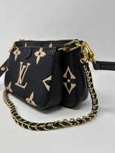 Louis Vuitton Bag, Bicolor Monogram Empreinte Leather
Multi Pochette Accessoires