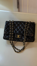 Chanel Bag, 2010 Black Lambskin Quilted Jumbo Single Flap Bag