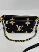 Louis Vuitton Bag, Bicolor Monogram Empreinte Leather
Multi Pochette Accessoires