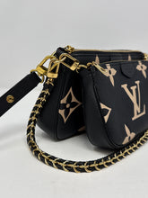 Louis Vuitton Bag, Bicolor Monogram Empreinte Leather
Multi Pochette Accessoires