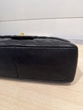 Chanel Bag, 2010 Black Lambskin Quilted Jumbo Single Flap Bag