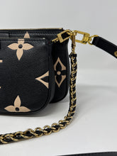 Louis Vuitton Bag, Bicolor Monogram Empreinte Leather
Multi Pochette Accessoires