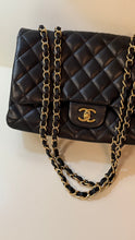 Chanel Bag, 2010 Black Lambskin Quilted Jumbo Single Flap Bag