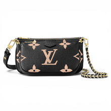 Louis Vuitton Bag, Bicolor Monogram Empreinte Leather
Multi Pochette Accessoires