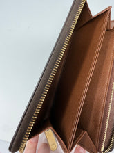 Louis Vuitton Monogram Canvas Zippy Wallet